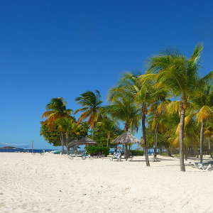 Palm Island beach location with white Caribbean sand