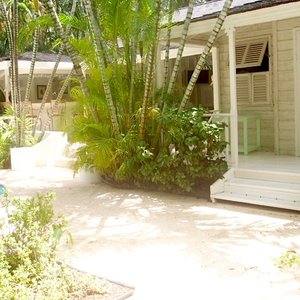 Tropical colonial white wood house veranda location