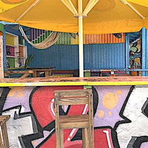 Bar with funky graffiti design in caribbean town