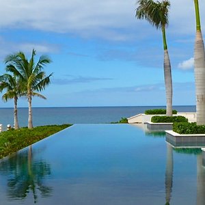 Modern infinity pool bar location in Anguilla