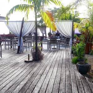 Weather beaten wooden deck location in the Caribbean