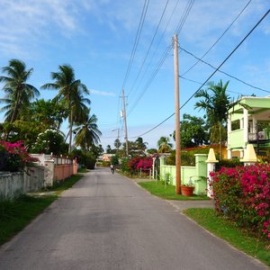 Colorful flower lined street in Caribbean village