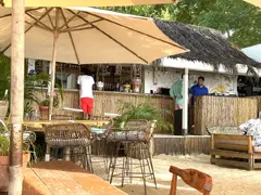 Beach Bar Built Of Bamboo With Delicious Food And Relaxing Hammocks