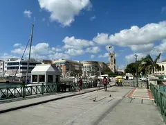 Bridge In Bridgetown Crossing Marina With View On To Barbados Parliament