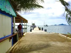 Dock On Grenadine Island For Catamarans And Fishing Boats