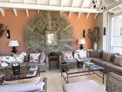 exceptional caribbean living with colorful cushions and fabulous wall decoration