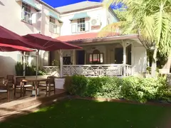 Traditional Caribbean Brickhouse In Light Colour With Patio And Shatters