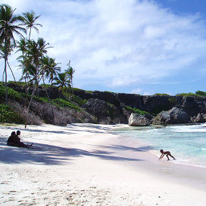 Turquoise water and white sand in Caribbean beach cove