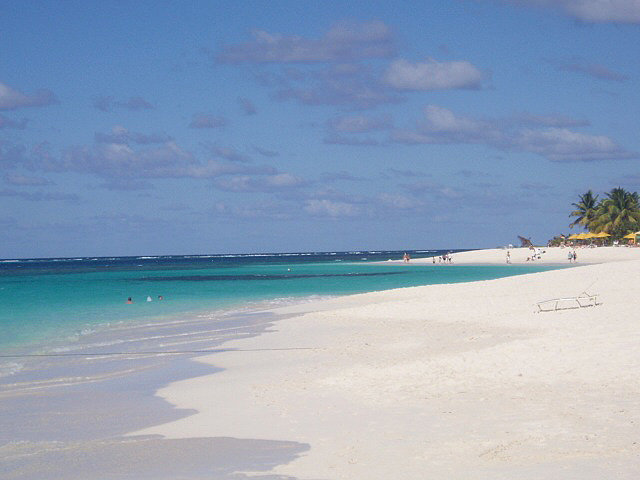 White sand long beach stretch location tropics