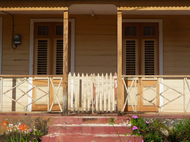 Local Caribbean wood house balcony photo location