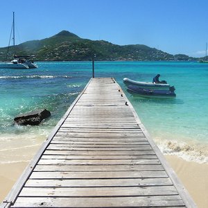 Fishing boat jetty for photo shooting location on Caribbean Island