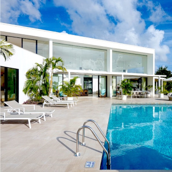 Modern white villa with pool in caribbean