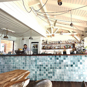 Bar on beach in Caribbean village