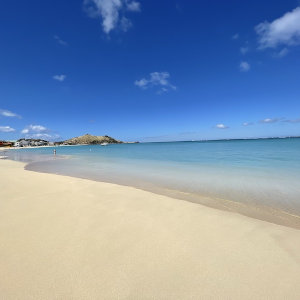 White sand beach on turqouise sea