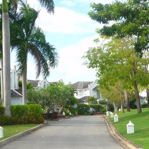 Street in luxury Caribbean resort with white villas