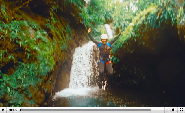 Waterfall jumping for commercial shoot in the Caribbean